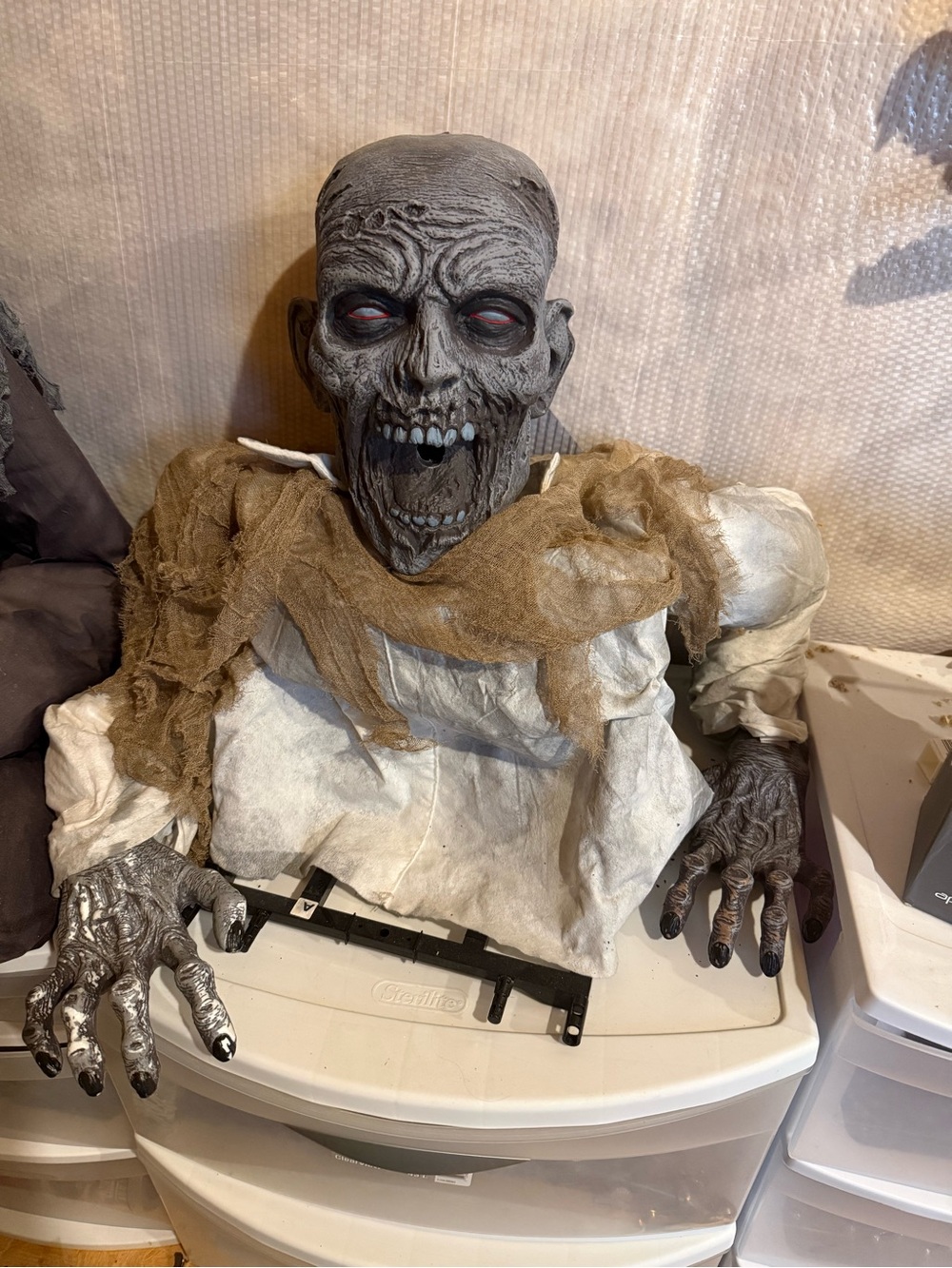 Scary Grey Zombie Prop with Tattered Brown Gauze